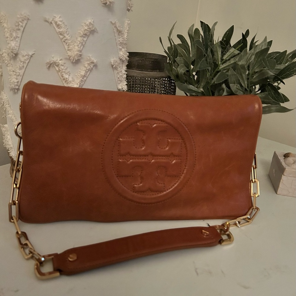 Tory Burch Brown Leather Clutch with Gold Chain.